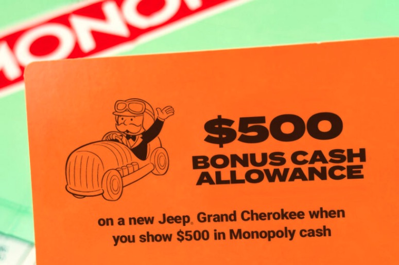 Bilgigant vil nu have betaling i Monopoly-penge