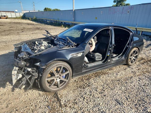 2014 BMW M5 — VIN WBSFV9C58ED593381