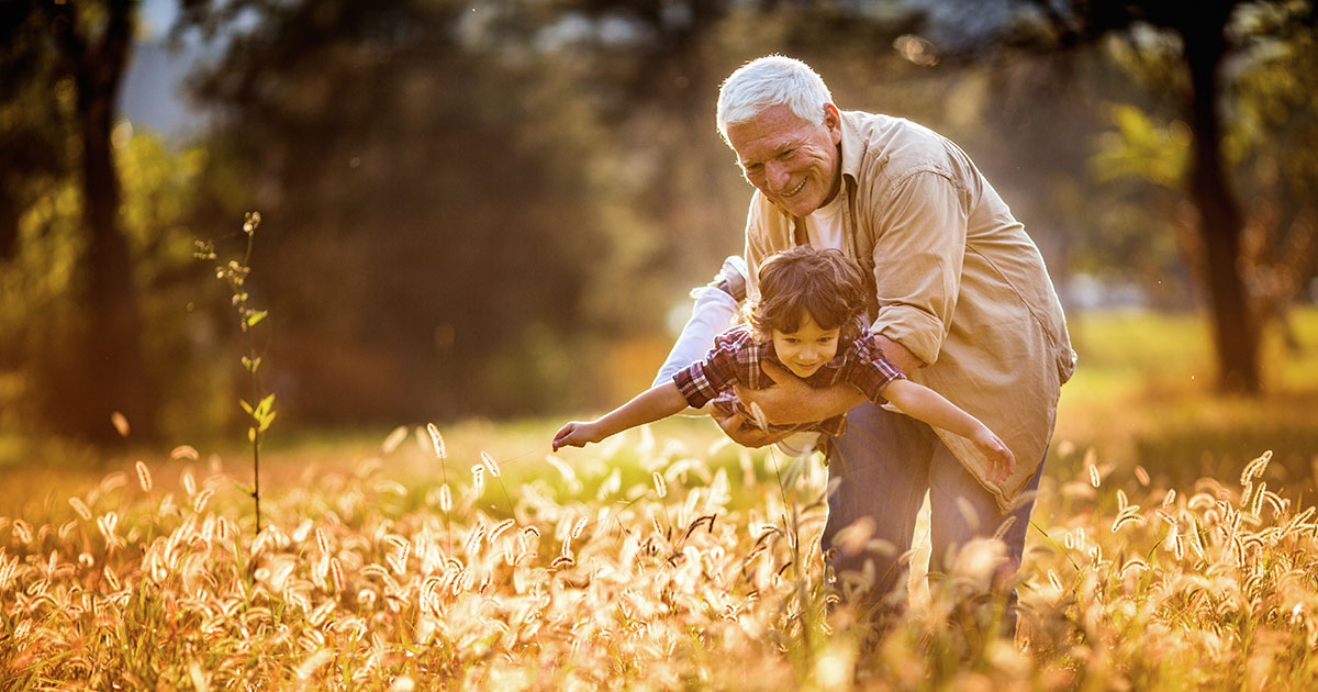 Grandfather playing with his grandson