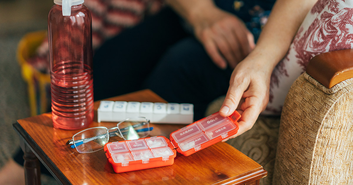 Pill organizer on a table