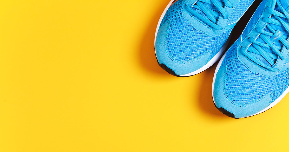 Blue shoes on a yellow background