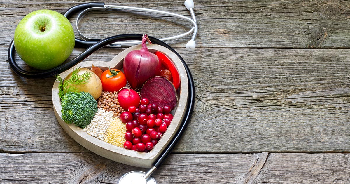 Stethoscope and healthy food