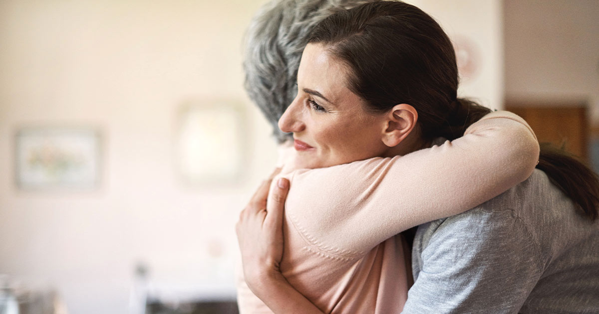 Two women hugging