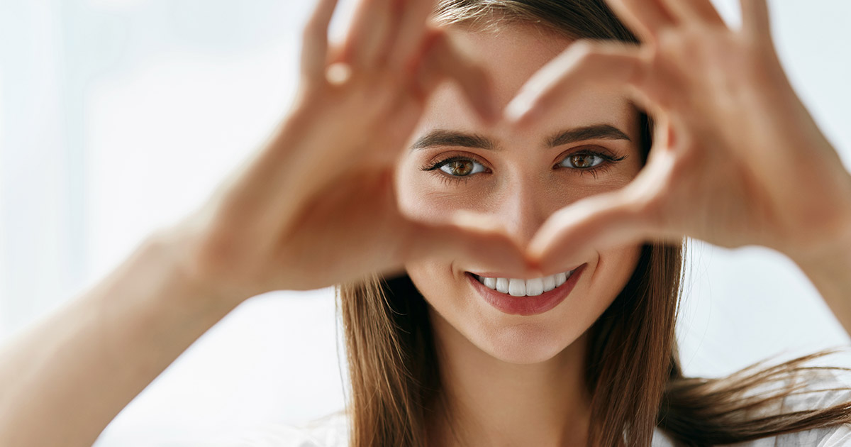 Woman making a heart with her hands