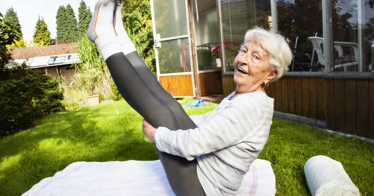 Elderly woman loving yoga!