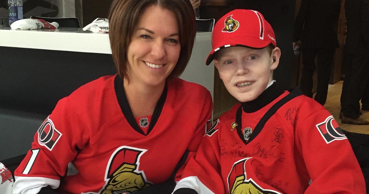 Tina Boileau and Jonathan Pitre at an Ottawa Senators game