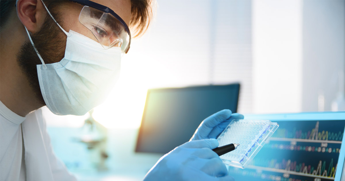 Medical technologist working on sample