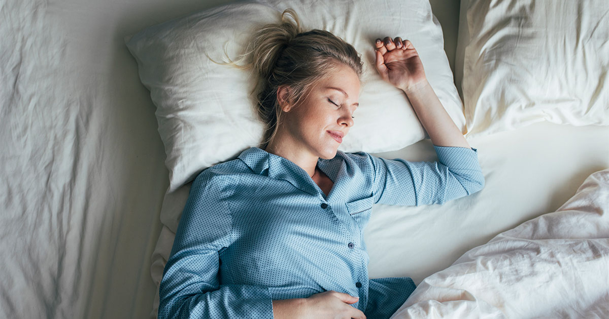 woman sleeping bed sleep health