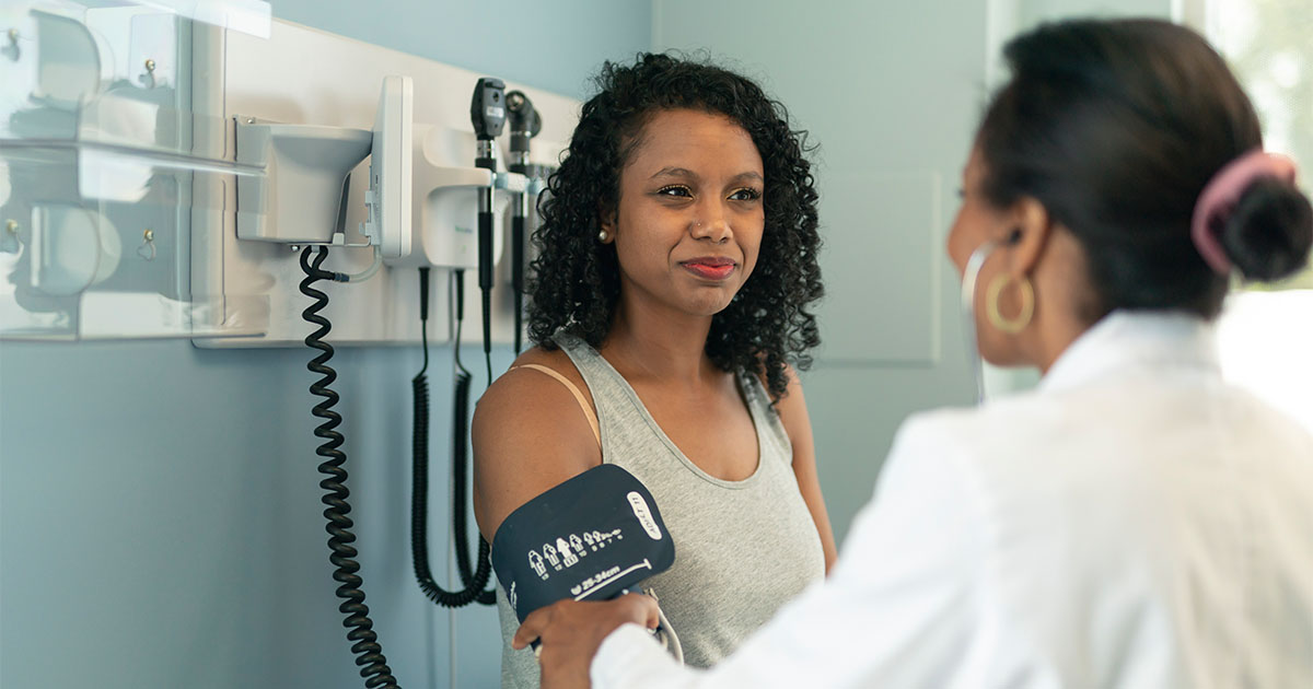 african american woman taking pulse