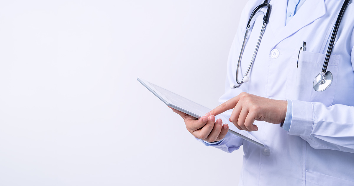doctor on tablet