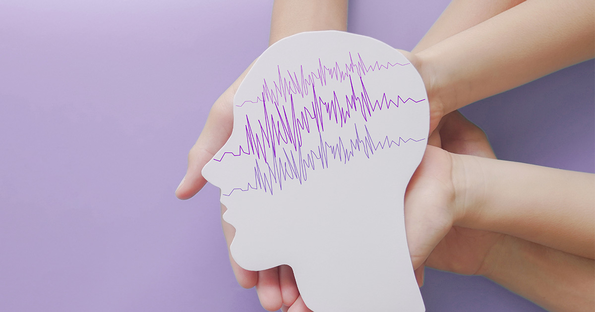 hands with paper cut out epilepsy