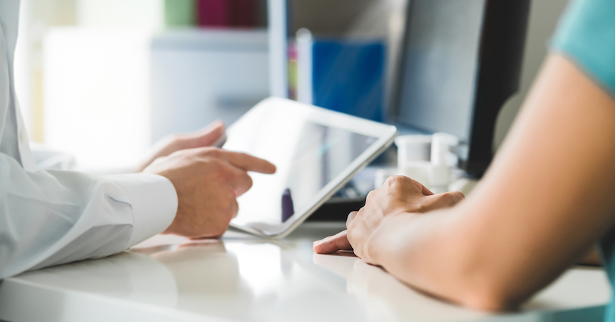 Doctor Using iPad
