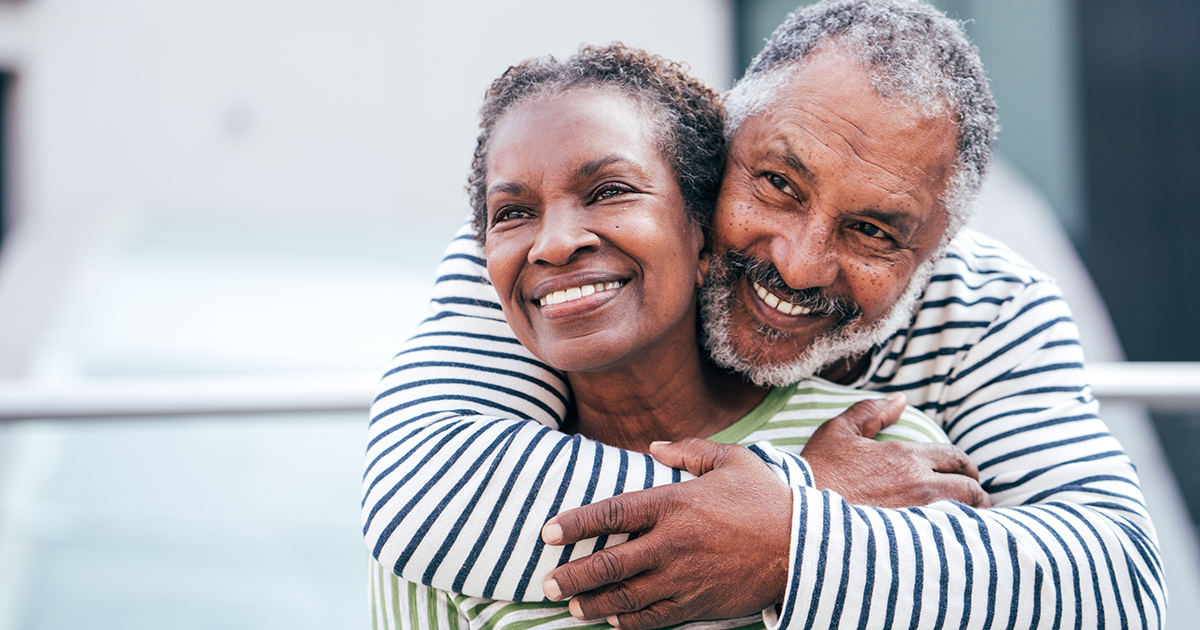 Elderly Black Couple Hugging