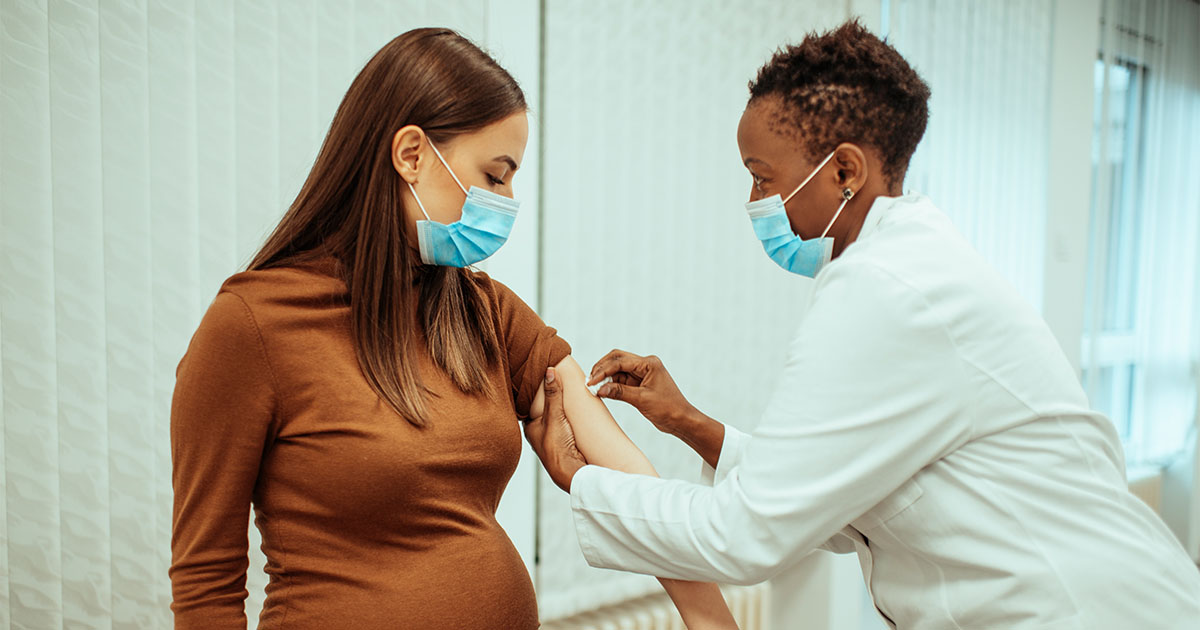 pregnant woman getting vaccinated