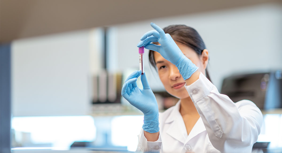 Woman in lab coat