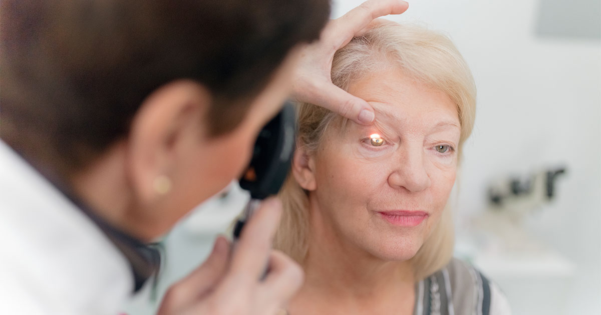 elderly woman getting eye test