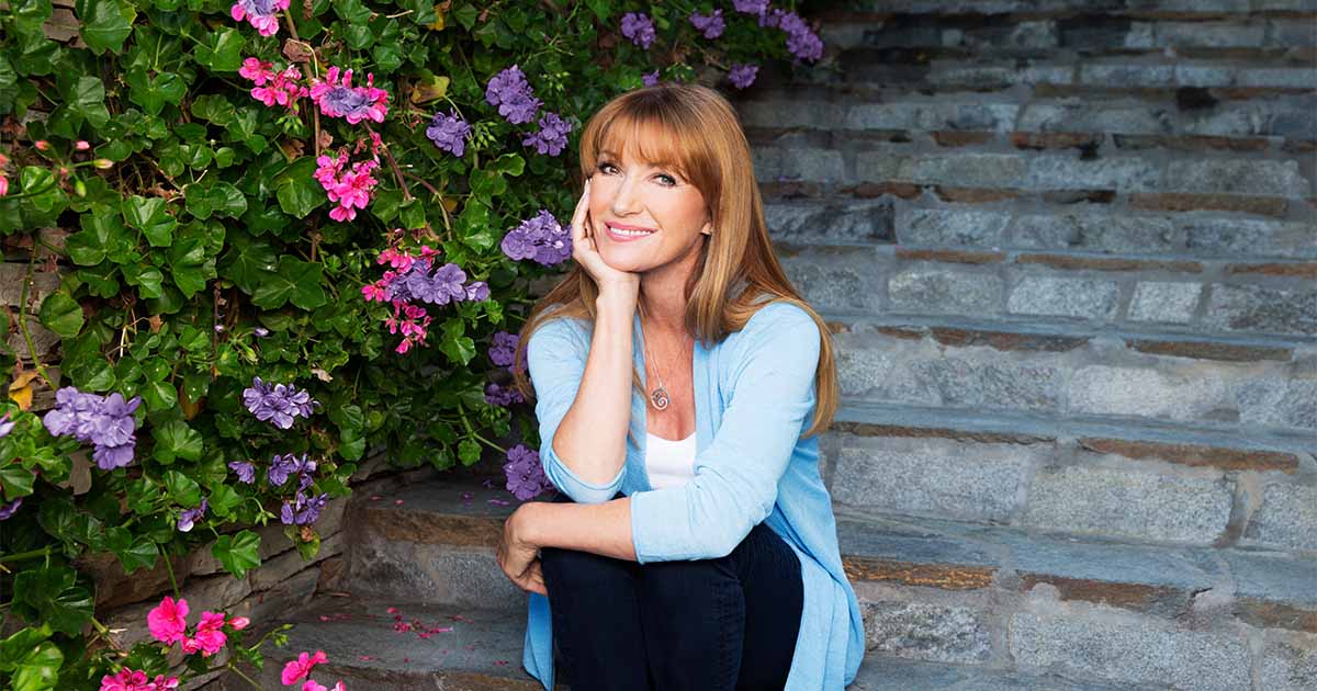 jane seymour sitting and smiling