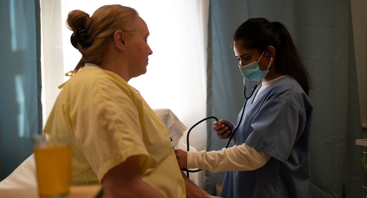 Nurse checking patient