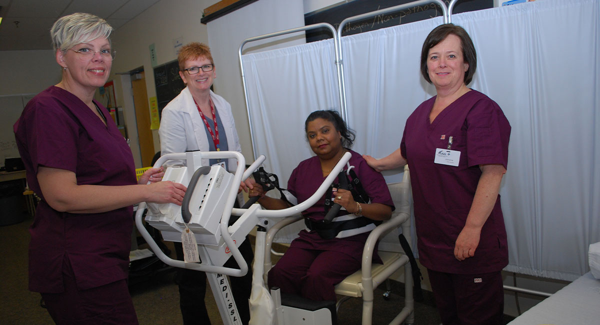 Healthcare workers testing equipment