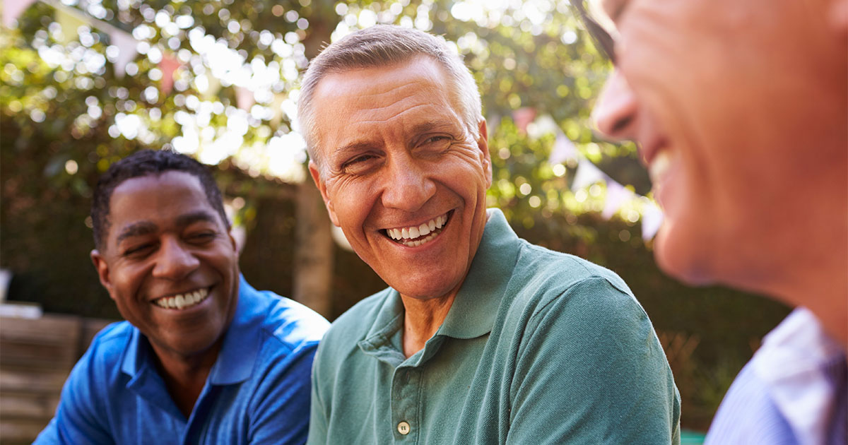 senior men smiling and laughing