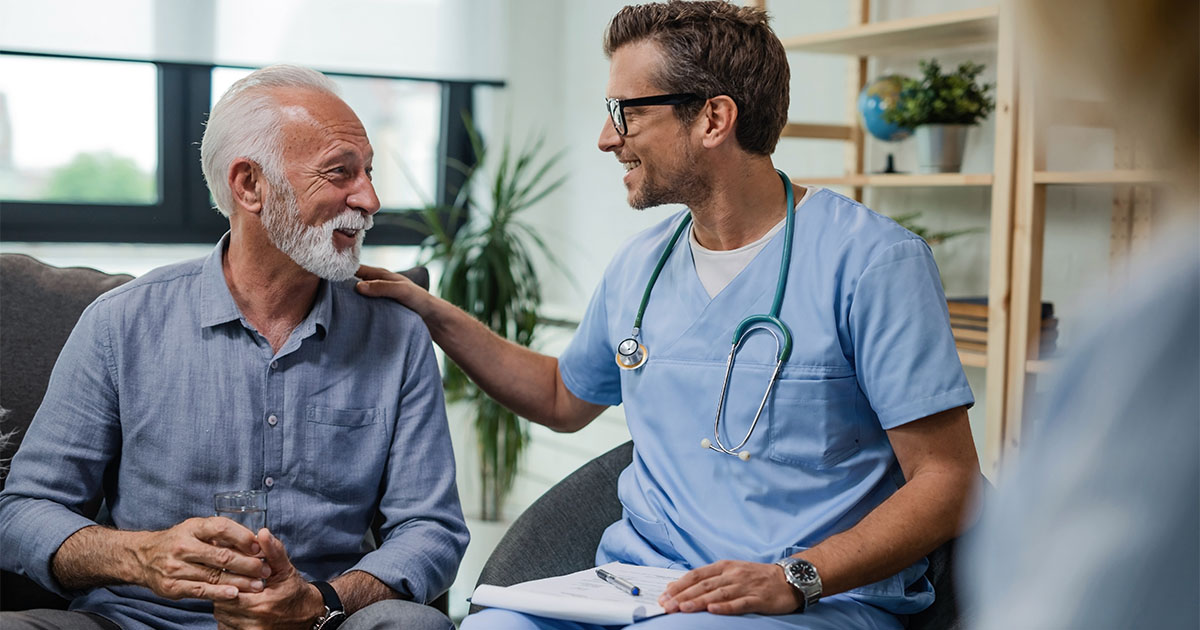aging senior receiving care from medical professional