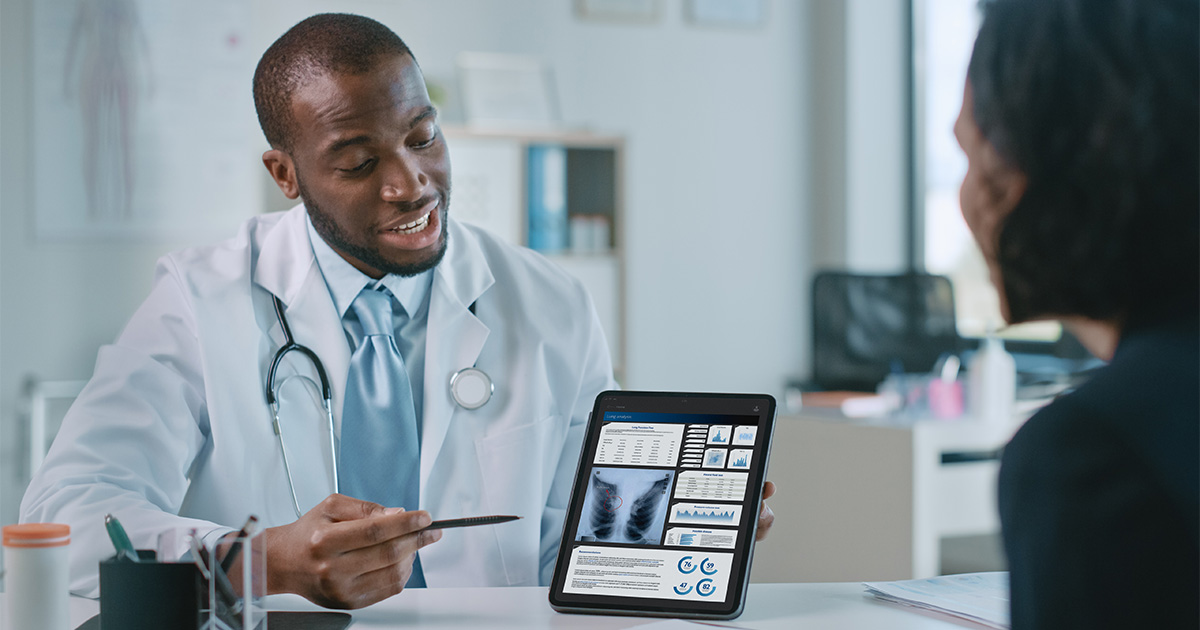 african american doctor explaining to patient