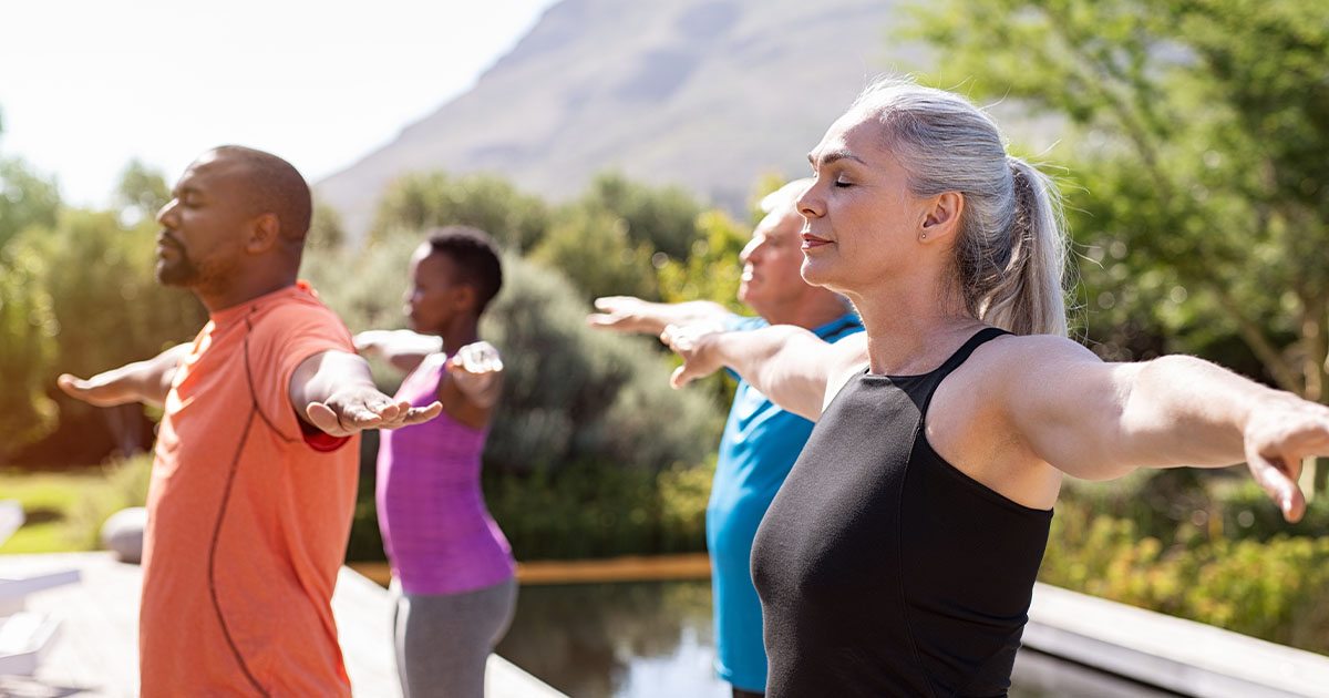 Elderly people doing yoga