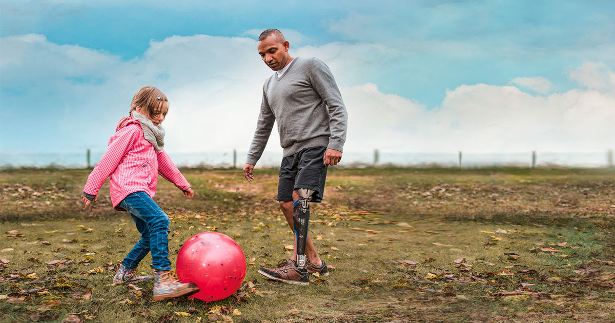 A picture of a man playing with his child