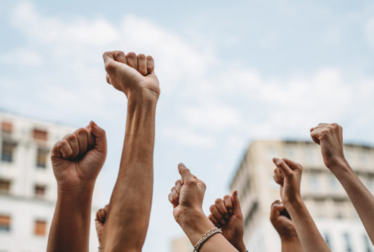 Fists up in the air promoting right to abortion