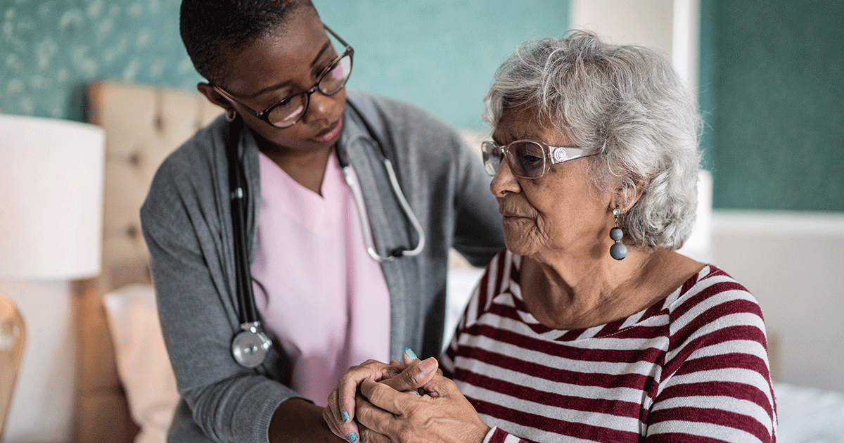 Doctor supporting patient with dementia
