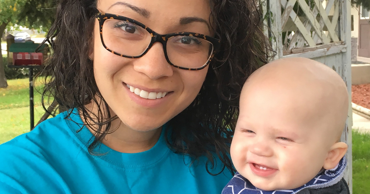 Starla, mother and ovarian cancer patient, with her child
