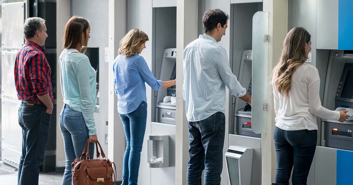 People using ATMs