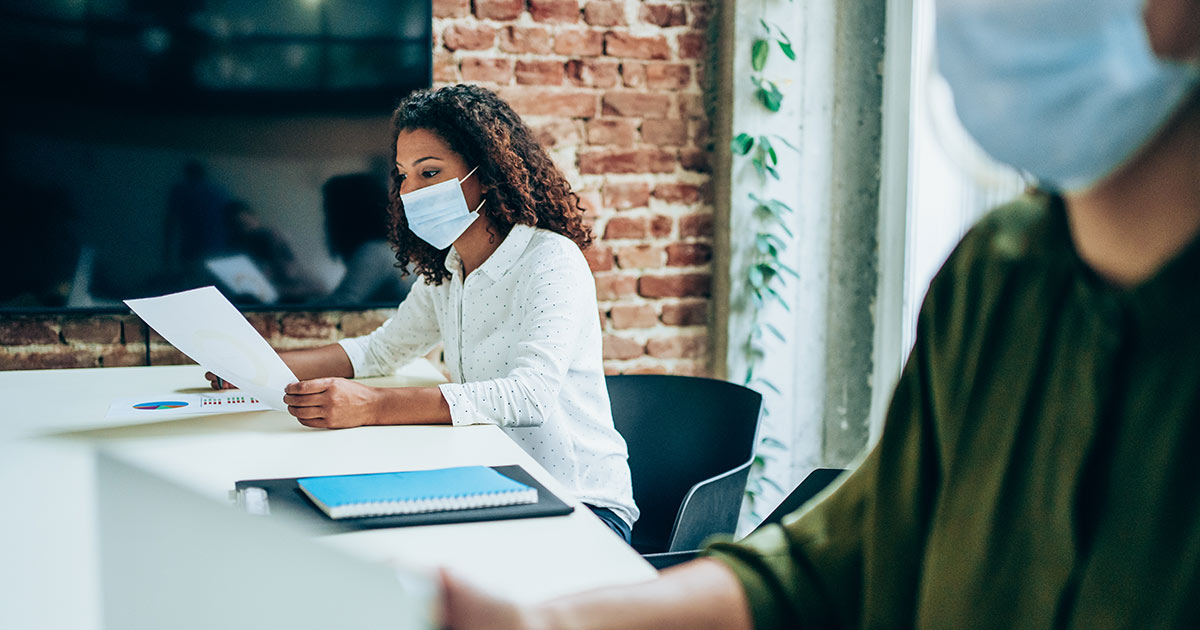 Office workers wearing face masks