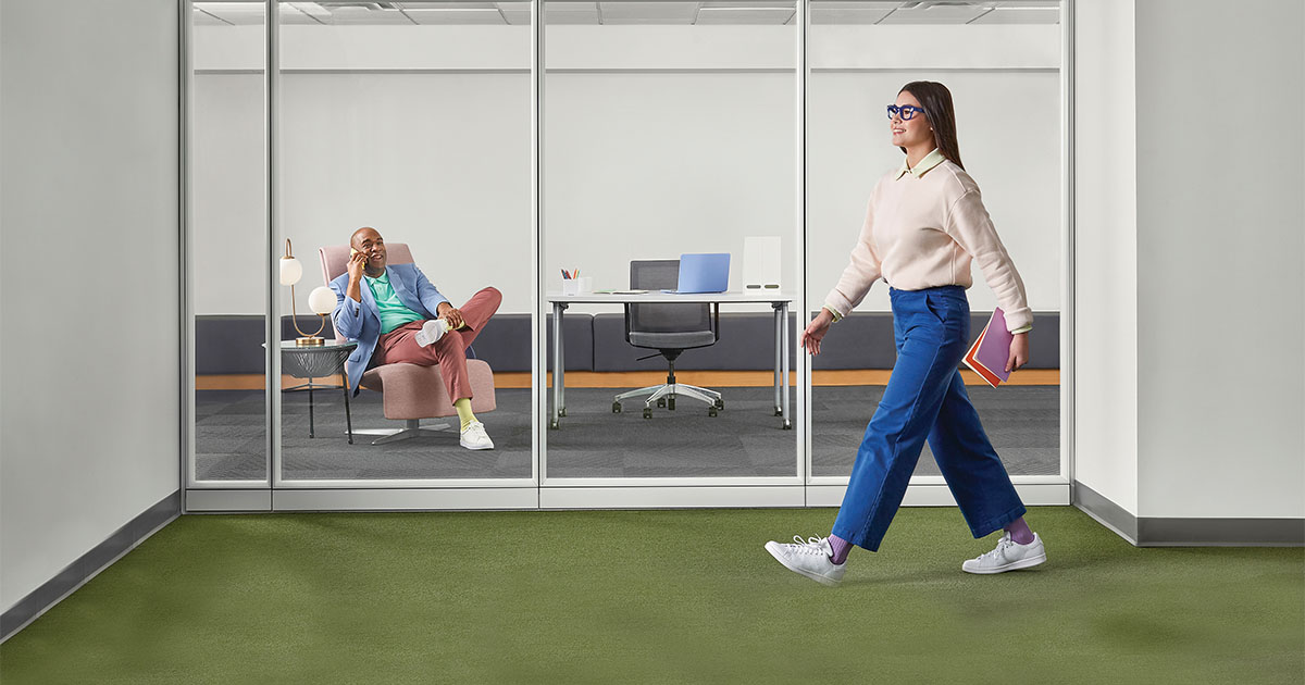 woman walking in office technation