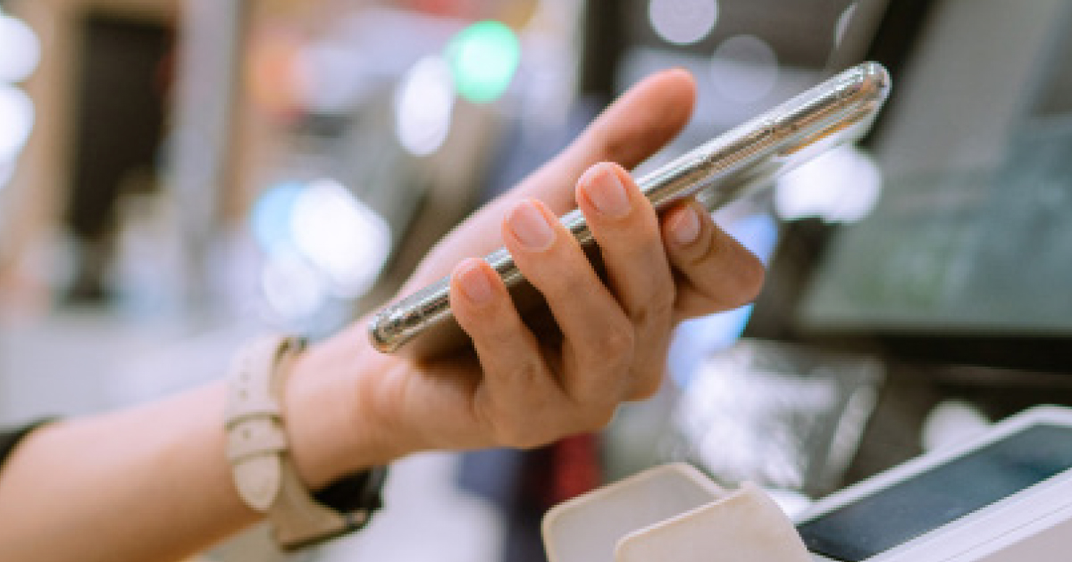 Women Holding Cellphone