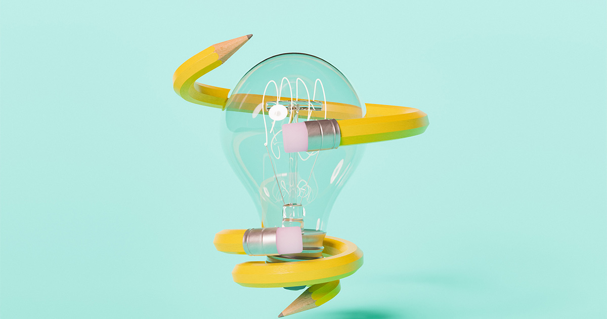 yellow pencil on lightbulb