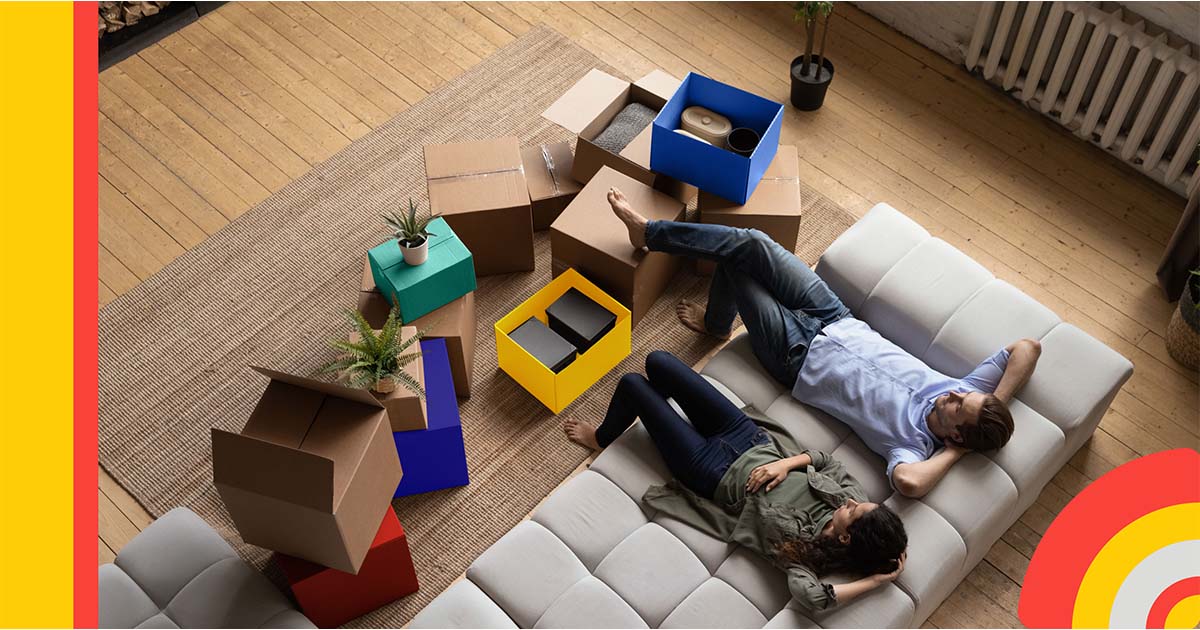 Two people sitting on a couch