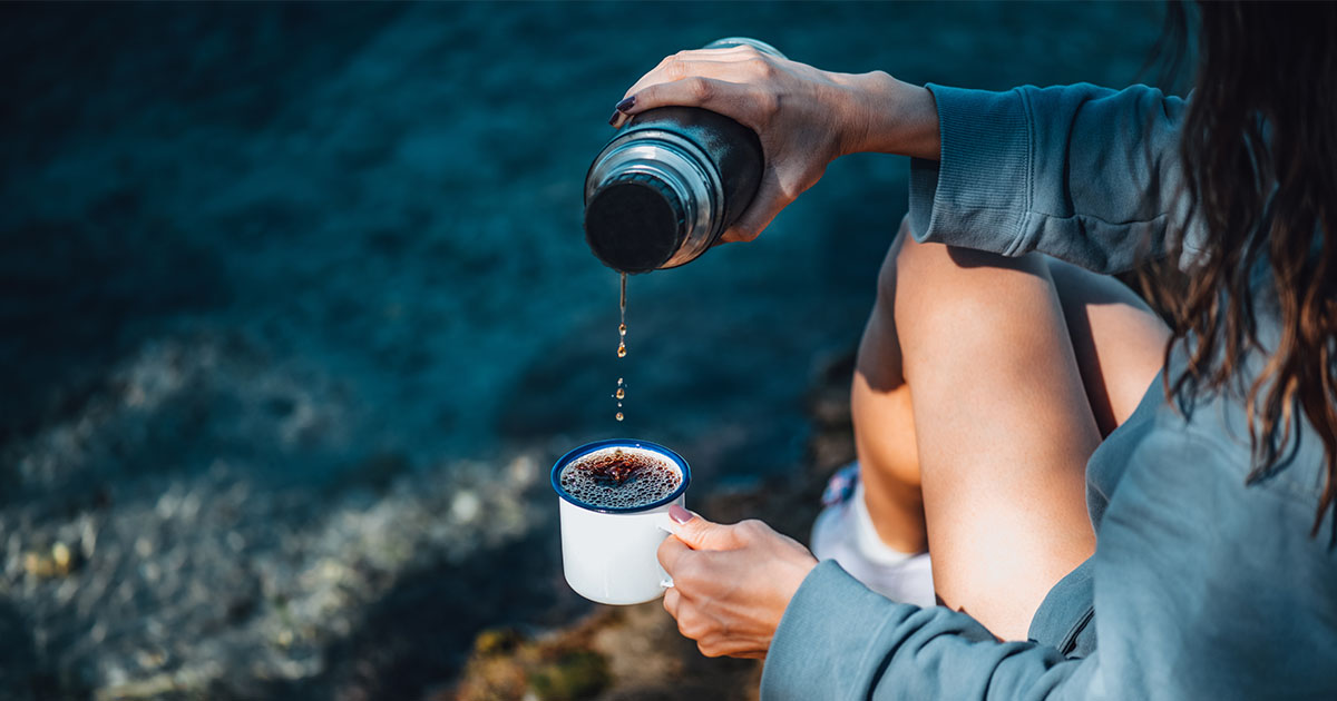 person pouring coffee