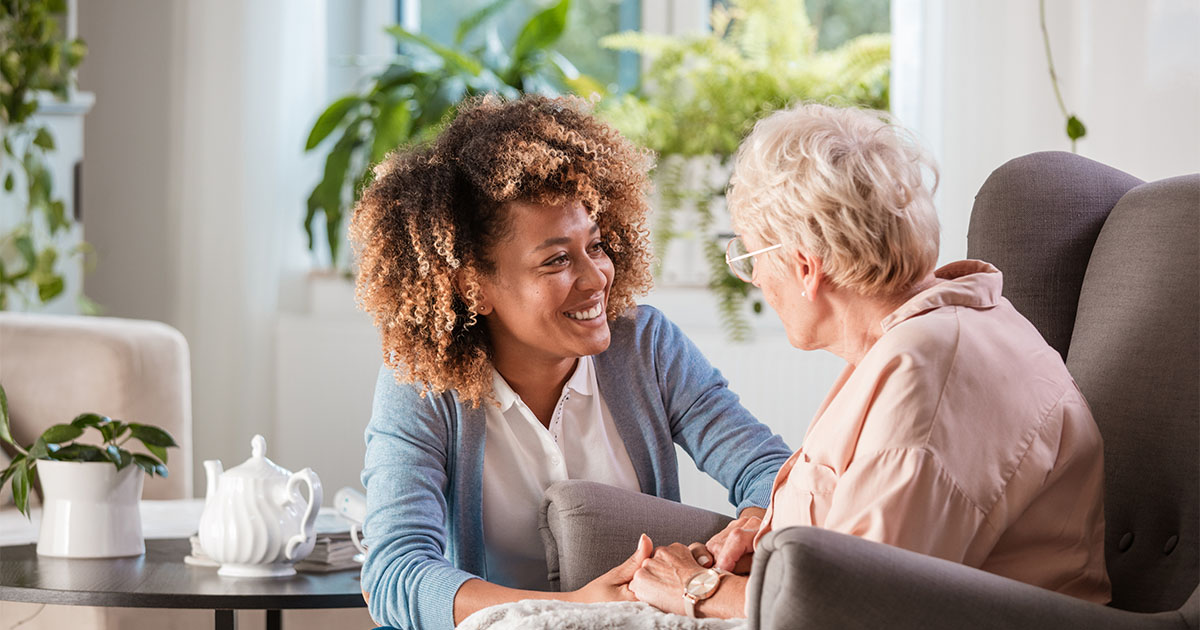 nurse caring for elderly lady