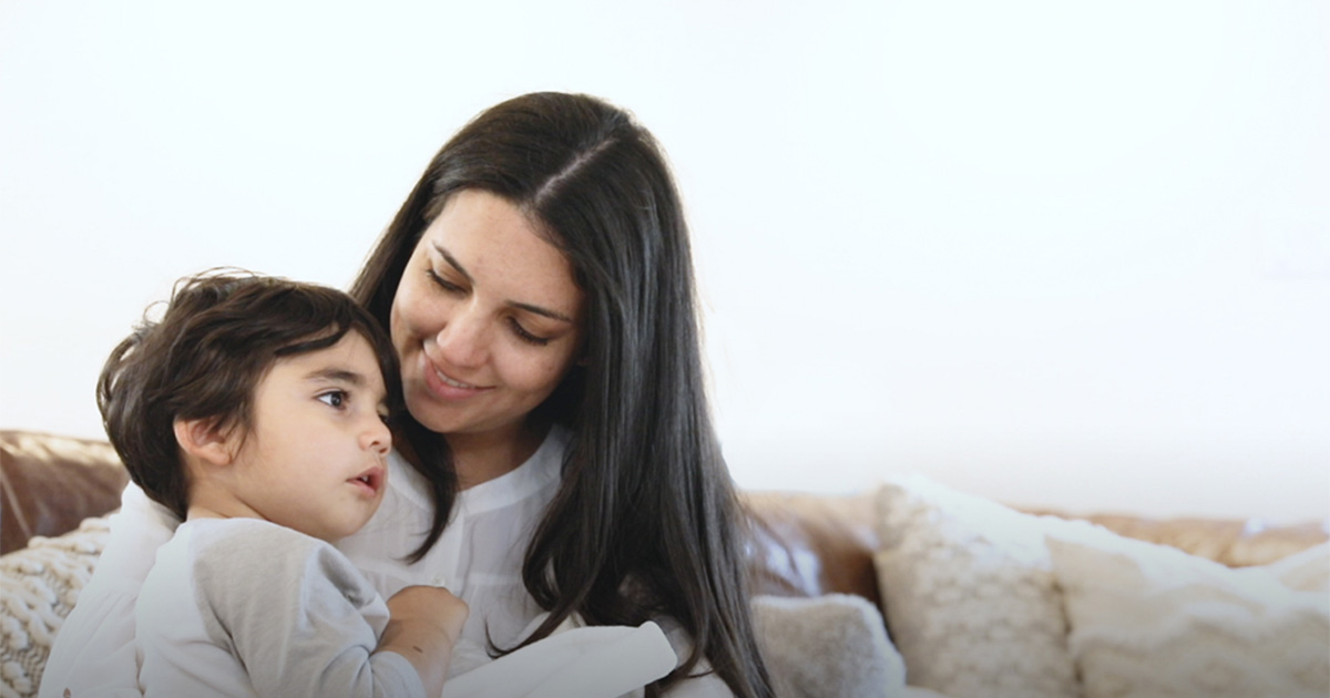A mother holding her child