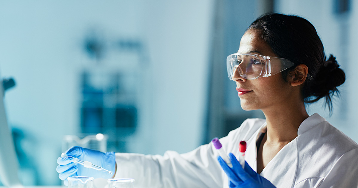 A picture of a lab scientist doing tests