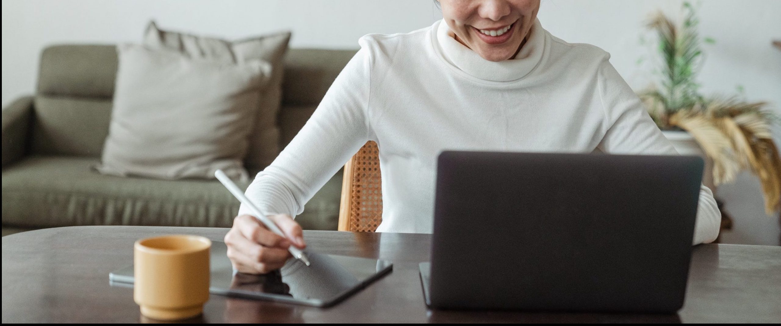 A woman using her computer.