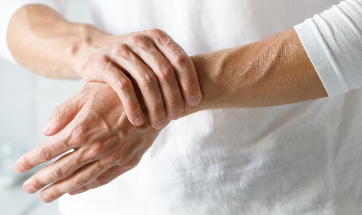 man with joint pain