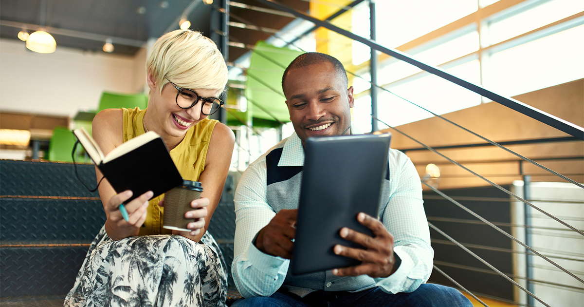 small business owners working on social media