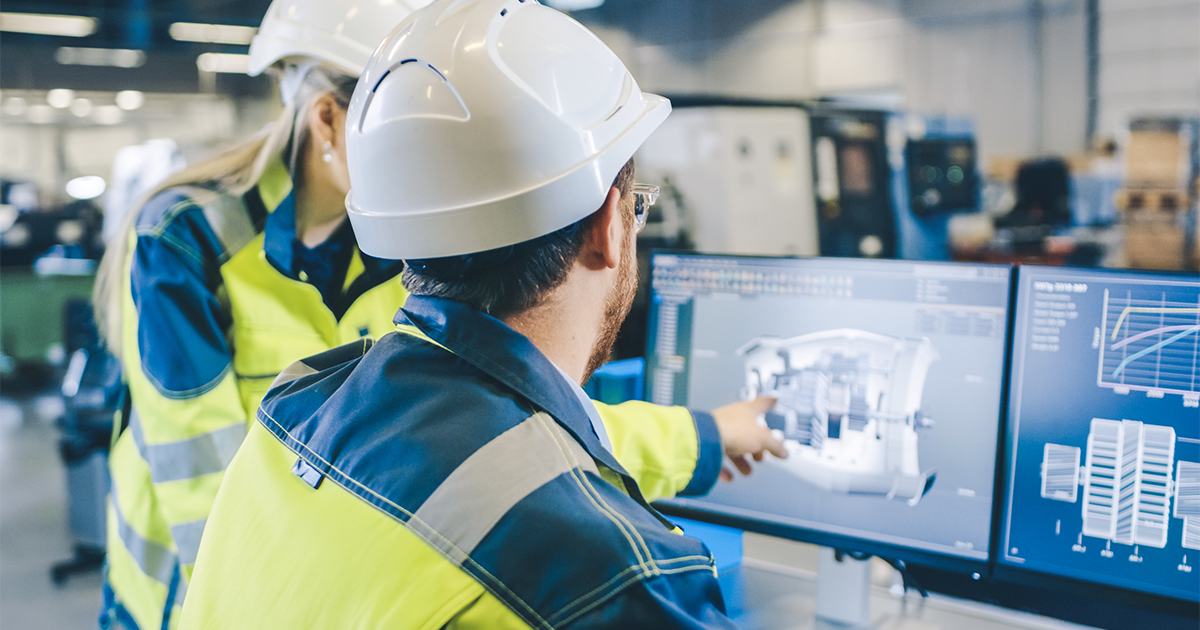 Male Mechanical Engineer and Female Chief Engineer Work Together