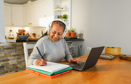 woman doing digital class webinar from home