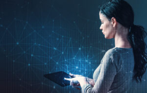 F3 with business woman using a tablet computer.