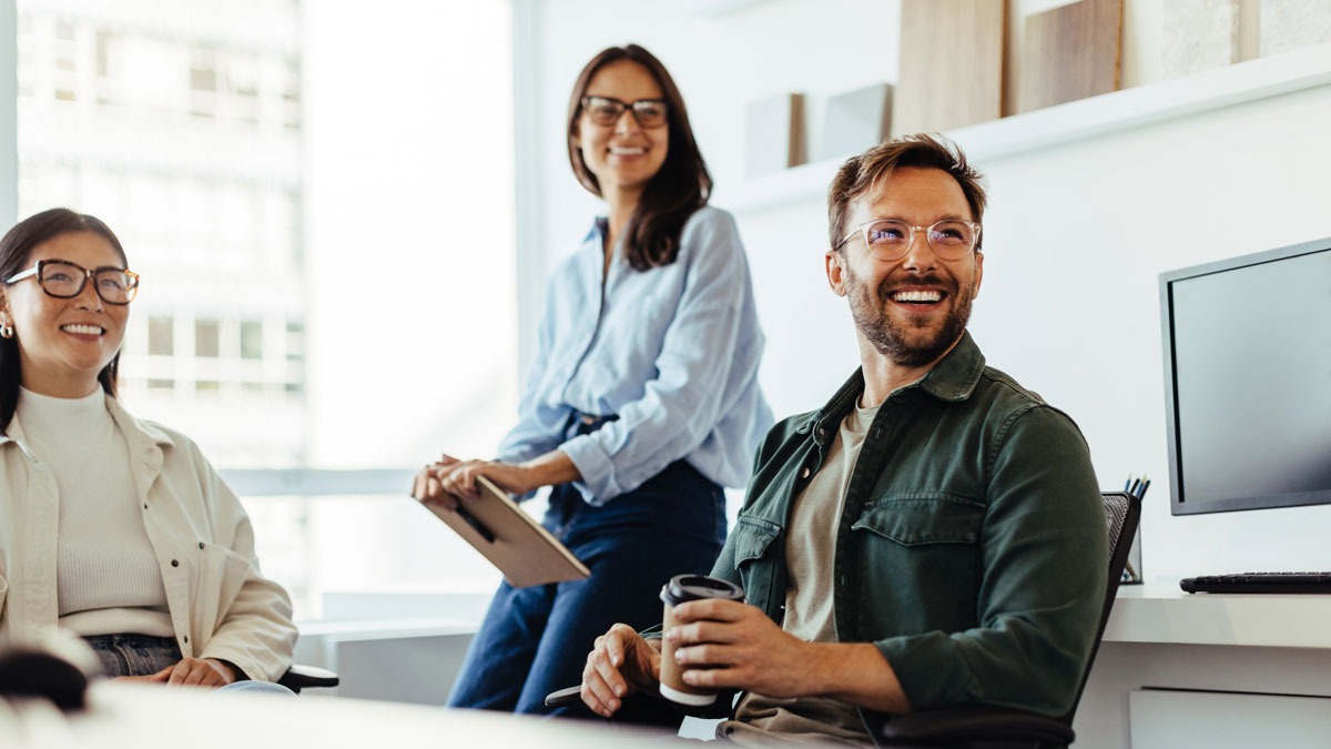 Professionals listening to a discussion in an office