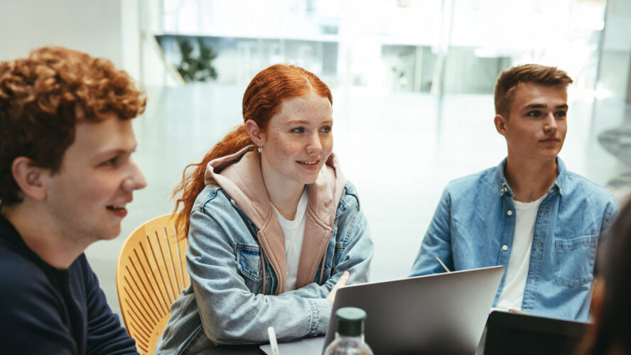 Group of friends working on a college assignment