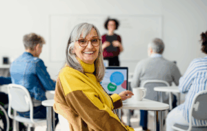 Portrait of senior attending computer and technology education class.